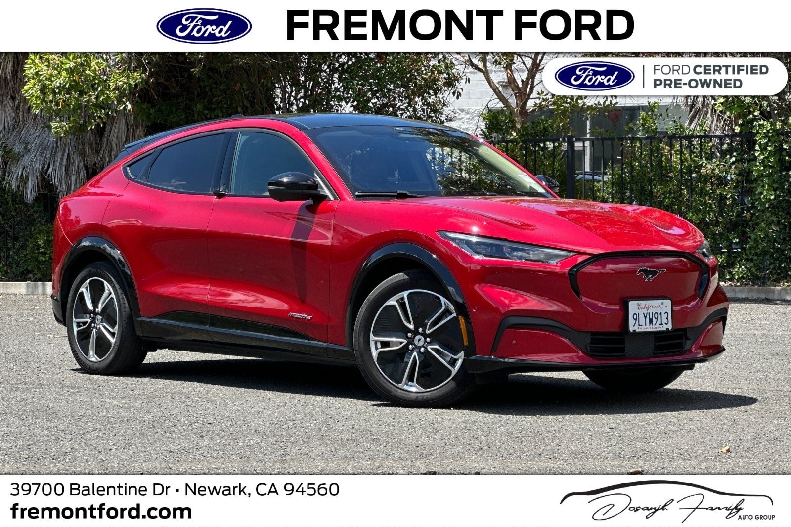 2023 Ford Mustang Mach-E Premium in Rapid Red Metallic Tinted Clearcoat — front three-quarter view